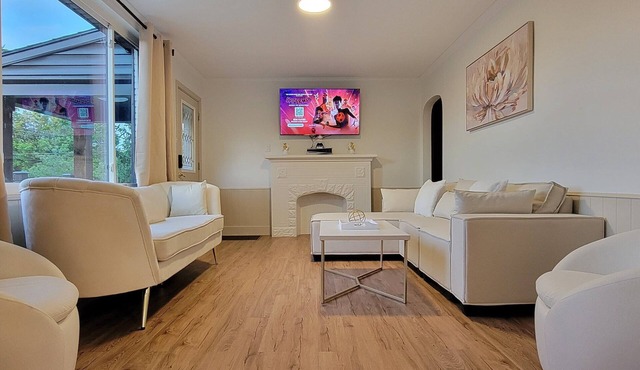 Modern Cozy Retreat: 2 King, 1 Queen, PS5, & Sunroom