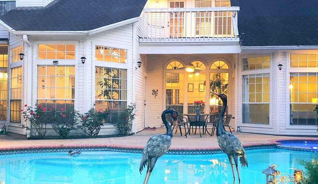 Modern Custom Home in Prestigious Champions Golf Club Community