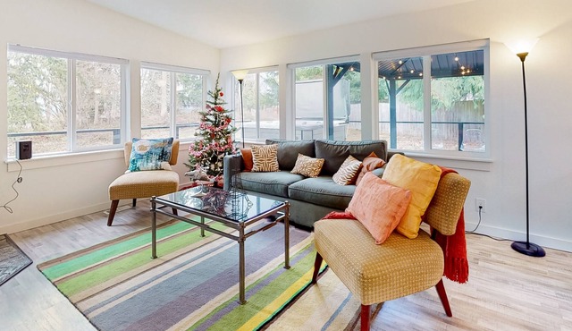 Modern dog-friendly home with private hot tub, fantastic deck, & woodstove