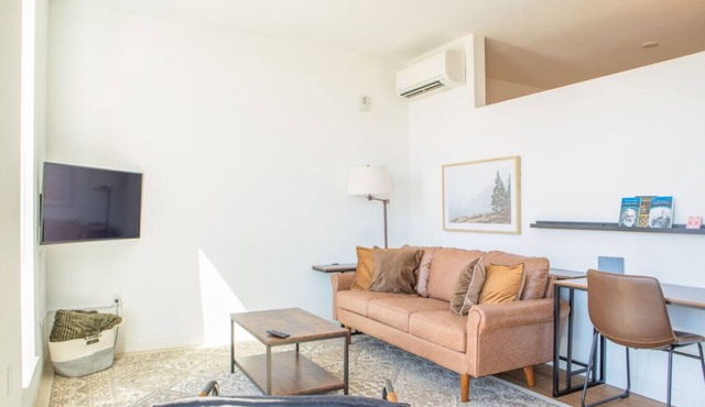 Modern East Side 1BR Apt with Balcony, Pool, and Gym