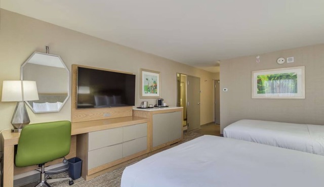 Modern Eco-Friendly Room Perfect for Leisure Travelers with Pool & Dining Nearby