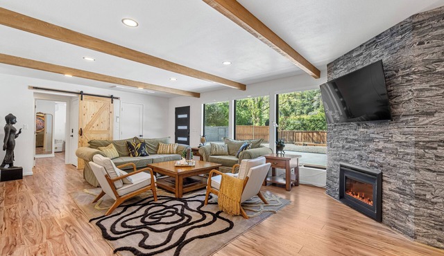 Modern elegance in the redwoods, steps from the magnificent river beach