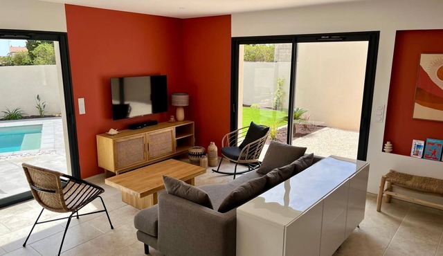 Modern family villa with swimming pool close to the sea