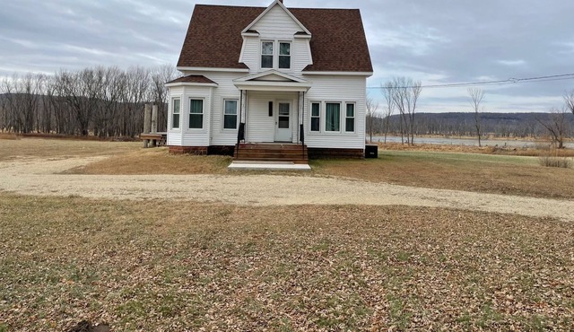 Modern Farmhouse north of town right by the Mississippi River