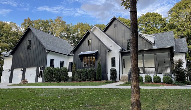 Modern farmhouse on 24 acres of trees with a heated pool