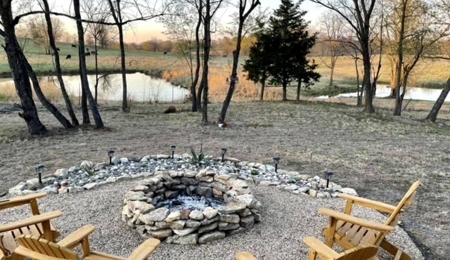 Modern farmhouse on 5+ acres, beautifully landscaped with outdoor entertainment