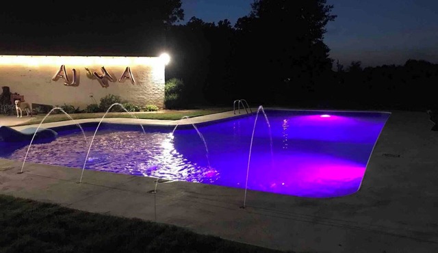 Modern Farmhouse on 6 acres, 7 bedrooms, with a pool.