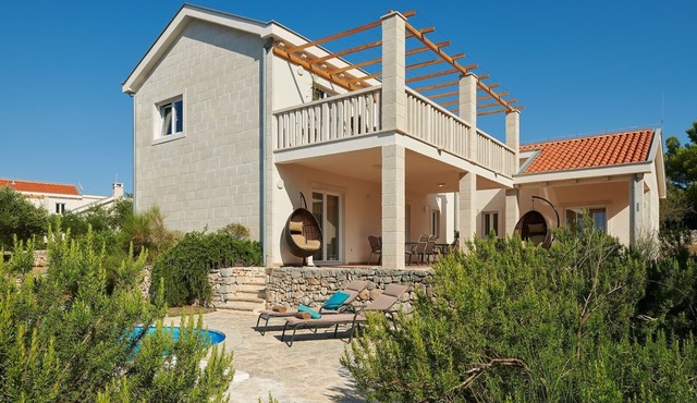 Modern four-bedroom Villa Nella with private pool and beautiful sea view