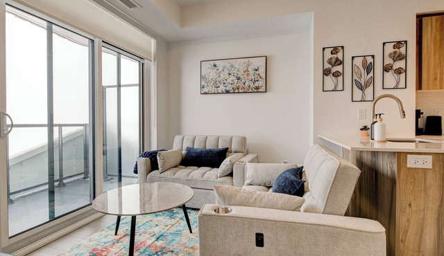 Modern High-Rise Condo w City Views & Balcony