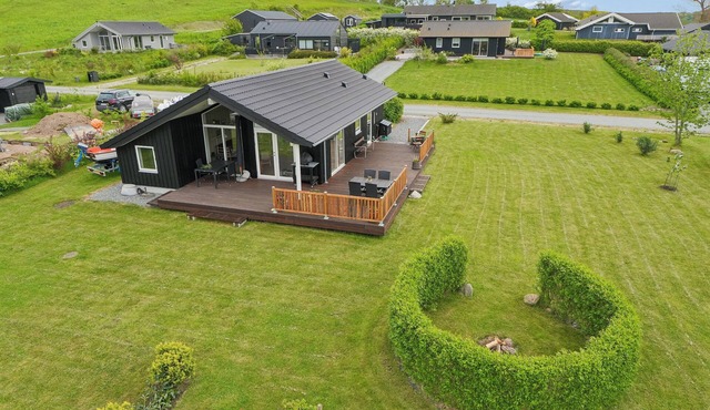 Modern holiday home near beach and nature Helnaes