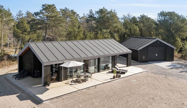 Modern holiday near fjord and beach