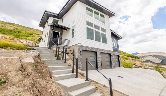 Modern home at foot of mountain