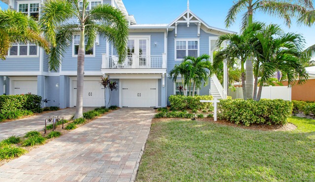 Modern home near Gulf beaches with private heated pool & WiFi