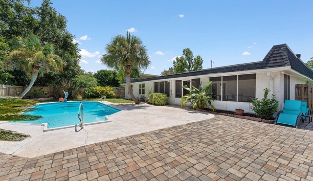 Modern Home with Heated Pool, Game Room, and 4 miles to the Beach!