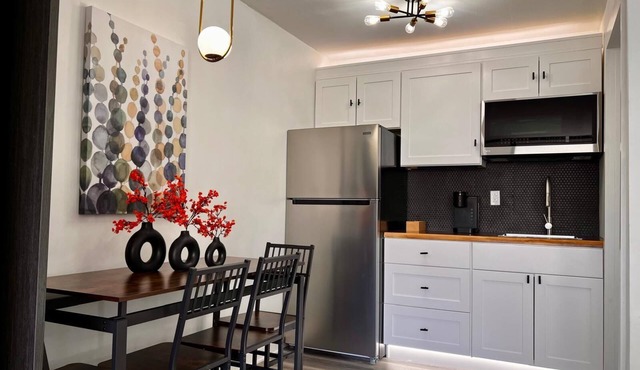 Modern hotel suite with kitchenette in charming Shamrock