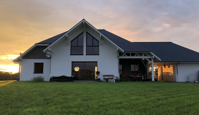 Modern house in the countryside between sea and mountains