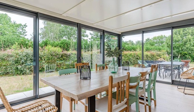 Modern house near lake with garden and veranda in Sanguinet, for 10 people