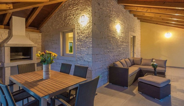 Modern house with pool and beautiful landscaped environment in a quiet location