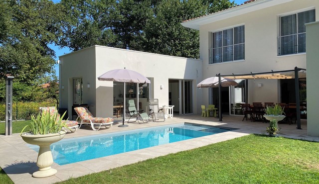 Modern house with swimming pool near the coast