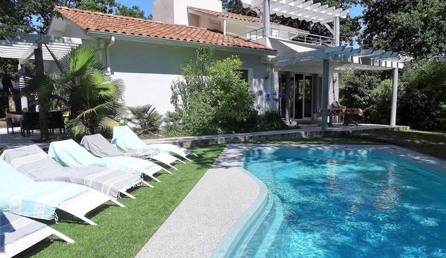 Modern house with swimming pool close to the beach