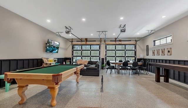 Modern Lake Home with game room and large patio in Spicer