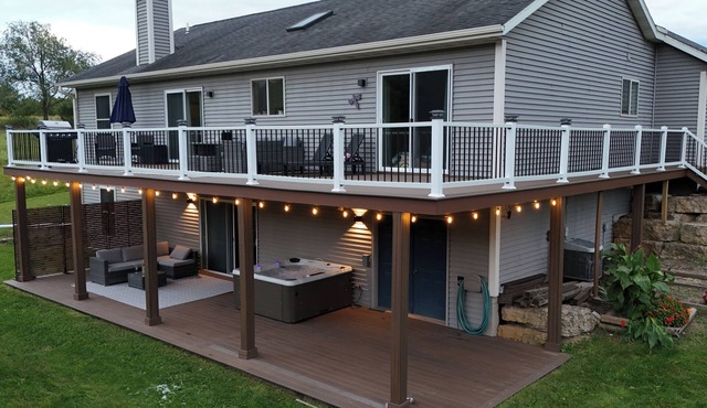Modern Lake Retreat with Hot Tub, Game Room & Two-Tier Deck