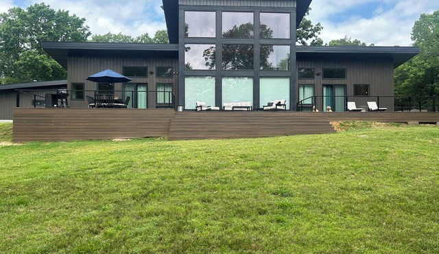 Modern Lakefront home with gentle walk to lake, flat yard. Beautiful views.