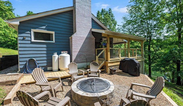 Modern lakefront home with dock, deck, and direct Claytor Lake access for swimming and fishing!
