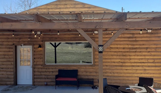 Modern Log Cabin with indoor and outdoor jacuzzi tubs