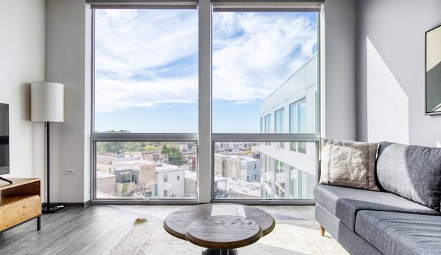Modern Logan Square 1BR w/Roof Deck & Gym, 1 block to L, by Blueground