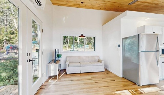 Modern Maine cottage with river views, deck, and a convenient washer/dryer