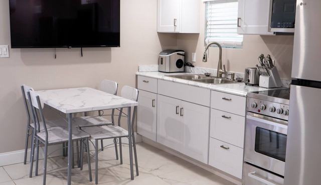 Modern Miami Gardens Stay Near Hard Rock Stadium at this 2 bedroom one bath home