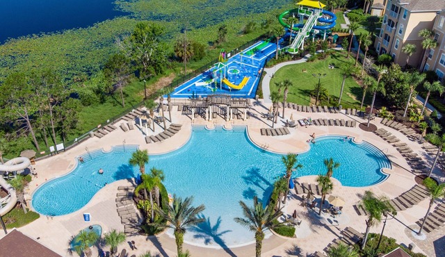 Modern Mickey themed condo perfect for families, two miles from Disney!