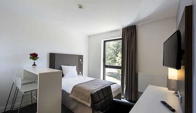 Modern Mini-Apartment with Kitchen Amenities & Peaceful Surroundings