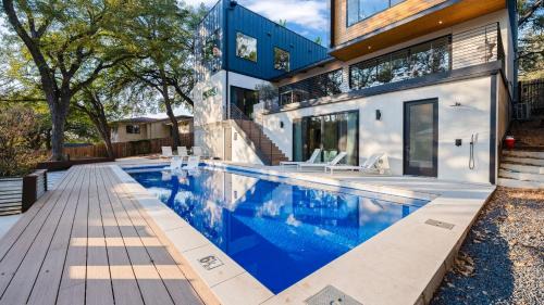 Modern Oasis w Pool Hot Tub Rooftop Deck Home Theater Mariposa Retreat by AvantStay