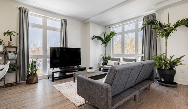 Modern open-concept, 2-bedroom townhouse with plenty of natural light.