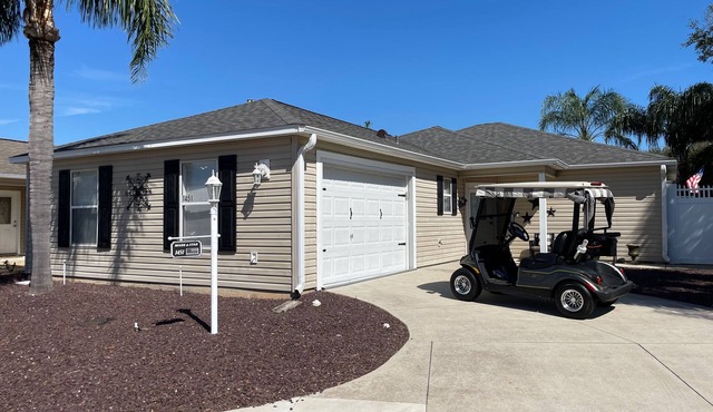 Modern Open-Plan Home w/Updated Kitchen, Private Lanai & Golf Cart