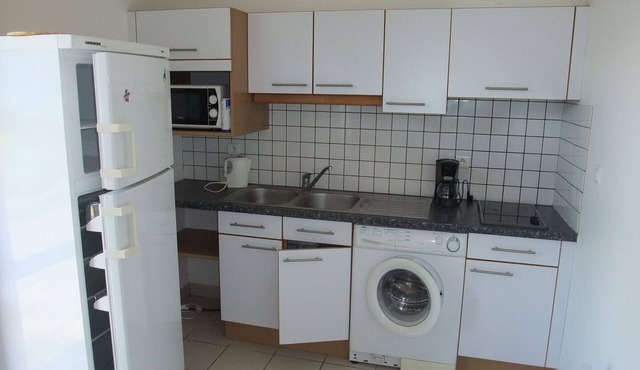 Modern pavilion with terrace overlooking river