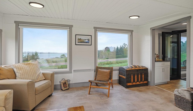 Modern PEI Shipping Container Retreat with Multiple Decks & Stunning Views