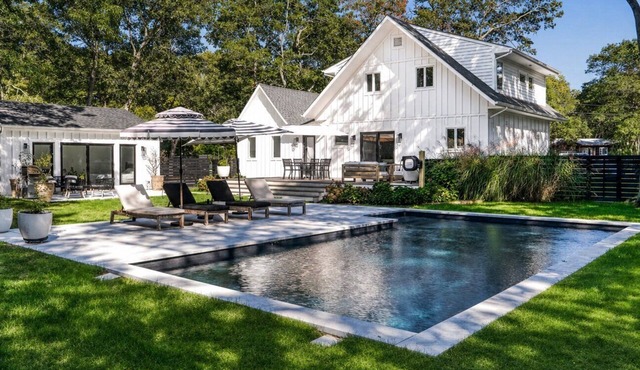 Modern Quogue Escape with Pool & Pool House, Luxurious Indoor-Outdoor.