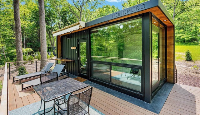 Modern Riverside Cabin w Hot Tub, Fire Pit, Kayaks