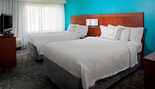 Modern Room Perfect for Relaxing Getaways: Heated Pool, On-Site Market & More