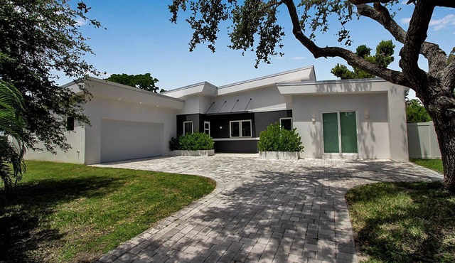 Modern Sarasota Retreat with private heated pool and large yard