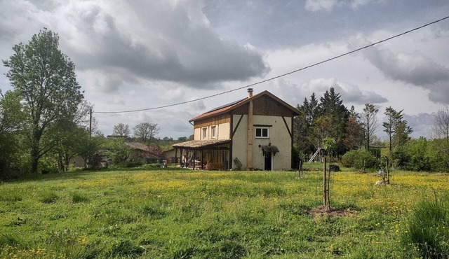 Modern spacious barn conversion surrounded by nature with shared swimming pool