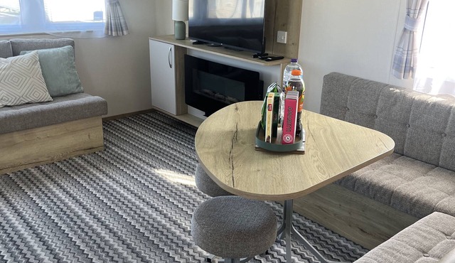 Modern static caravan available at popular Seton Sands Holiday Village.