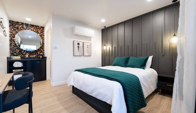 Modern Stay with a Queen Bed and Extras