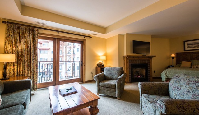 Modern Studio Condo | Fireplace and Balcony
