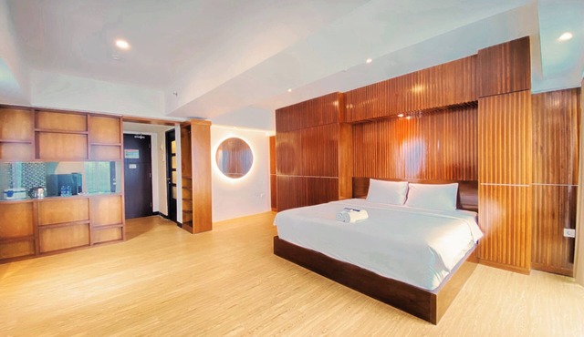 Modern Studio Room Apartment At Tamansari La Grande