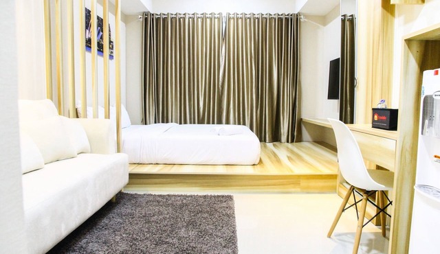 Modern Style The Oasis Studio Apartment with Comfortable Sofa