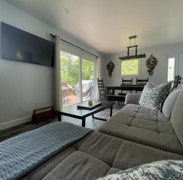 Modern, Sunset Waterfront Cottage with EV Charger